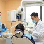 Dentist examining a patient in a modern dental clinic with advanced equipment.