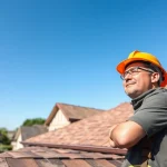 Roofing contractor professionally inspecting a roof in a suburban neighborhood, ensuring quality work.